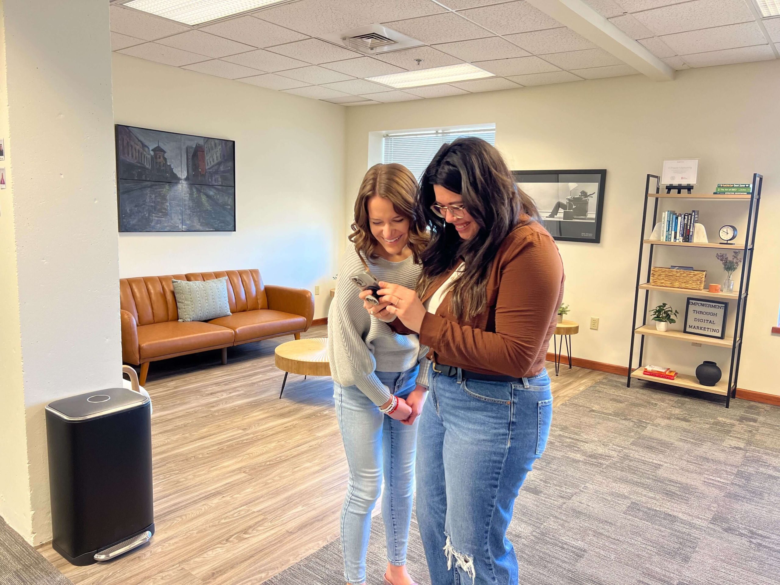 E-Power Employees Looking at Phone